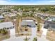An aerial view of the home showcasing the property's layout, surrounding landscape, and neighborhood at 6531 Marius Rd, North Port, FL 34287