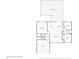 Layout of the house showing the primary bedroom, kitchen, living room, and garage at 7135 Tropicaire Blvd, North Port, FL 34291
