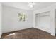Comfortable bedroom features window, closet and ceiling fan at 815 Papaya Dr, Tampa, FL 33619