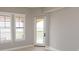 Relaxing balcony with seating accessible from bedroom with plantation shuttered windows at 99 Vivante Blvd # 311, Punta Gorda, FL 33950