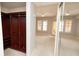 Bedroom with large walk-in closet and natural light from plantation-shuttered windows at 99 Vivante Blvd # 311, Punta Gorda, FL 33950