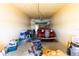 Spacious garage featuring a vintage car, ample storage space, and an automatic door opener for modern convenience at 99 Vivante Blvd # 311, Punta Gorda, FL 33950