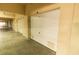 Row of garage doors in a well-lit parking area, offering secure parking at 99 Vivante Blvd # 311, Punta Gorda, FL 33950
