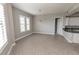 Bright, lovely kitchen with a large window and white cabinets at 99 Vivante Blvd # 311, Punta Gorda, FL 33950