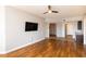 Lovely living room with hardwood floors and a view of the kitchen and other rooms at 99 Vivante Blvd # 311, Punta Gorda, FL 33950