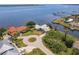 Aerial view of waterfront homes, boat docks, and canals in a residential neighborhood at 12439 Prather Ave, Port Charlotte, FL 33981