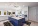 Bright, modern kitchen with a large island and sleek white cabinetry at 12439 Prather Ave, Port Charlotte, FL 33981