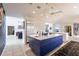 Bright, spacious kitchen featuring an island, white cabinets, and modern appliances at 12439 Prather Ave, Port Charlotte, FL 33981