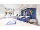 Modern kitchen featuring an island, sleek appliances, and ample countertop space at 12439 Prather Ave, Port Charlotte, FL 33981