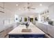Spacious kitchen with a large island, sleek cabinetry, and modern appliances at 12439 Prather Ave, Port Charlotte, FL 33981