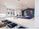 Contemporary kitchen featuring an island, integrated appliances, and plenty of natural light at 12439 Prather Ave, Port Charlotte, FL 33981