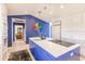Open kitchen layout showcasing white cabinets, stainless steel appliances, and a bright, airy feel at 12439 Prather Ave, Port Charlotte, FL 33981