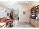 Comfortable living room offers a television and a built in shelving unit at 12439 Prather Ave, Port Charlotte, FL 33981