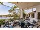 Beautiful screened patio overlooking the canal, perfect for outdoor entertaining at 12439 Prather Ave, Port Charlotte, FL 33981