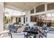 Expansive screened patio boasts ample seating and captivating water views at 12439 Prather Ave, Port Charlotte, FL 33981