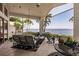 Relaxing screened patio with comfortable seating and scenic waterfront views at 12439 Prather Ave, Port Charlotte, FL 33981