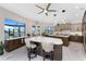 Open kitchen with large island, luxury appliances, and stunning views of the water at 1255 Eider Ct, Punta Gorda, FL 33950