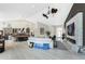 Large living area featuring a fireplace, modern décor, an open layout, and tile floors at 1255 Eider Ct, Punta Gorda, FL 33950