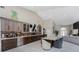 Bright living room featuring a modern bar, dining area, and seamless flow at 1255 Eider Ct, Punta Gorda, FL 33950