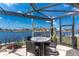Waterfront patio dining with views of the canal at 1255 Eider Ct, Punta Gorda, FL 33950