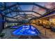 Backyard with a private pool, hot tub and outdoor seating at 1255 Eider Ct, Punta Gorda, FL 33950