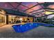 Outdoor pool with bar, jacuzzi and beach ball at 1255 Eider Ct, Punta Gorda, FL 33950
