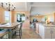 Open dining area with stylish chandelier and natural light at 14051 Heritage Landing Blvd # 536, Punta Gorda, FL 33955