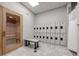 Well-equipped locker room featuring a sauna, modern lockers, and a convenient bench area at 14051 Heritage Landing Blvd # 536, Punta Gorda, FL 33955