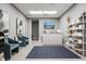 Stylish reception area with comfortable seating, artwork, and a product display shelf at 14051 Heritage Landing Blvd # 536, Punta Gorda, FL 33955