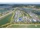 Expansive aerial view highlighting the community's integration with golf courses, lakes, and surrounding landscapes at 15830 Appalachian Dr, Punta Gorda, FL 33982