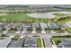 Scenic aerial view of homes along a waterfront and golf course at 15830 Appalachian Dr, Punta Gorda, FL 33982