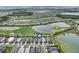 Stunning aerial shot of a community with golf courses, lakes, and well-manicured landscapes at 15830 Appalachian Dr, Punta Gorda, FL 33982
