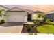 Charming single-Gathering home with a two-car garage, well-maintained landscaping, and a welcoming entrance at 15830 Appalachian Dr, Punta Gorda, FL 33982
