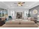 Cozy living room with plush seating, neutral decor, and ample natural light at 15830 Appalachian Dr, Punta Gorda, FL 33982