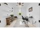 Bright home office with natural light, a ceiling fan, and a functional workspace at 15830 Appalachian Dr, Punta Gorda, FL 33982