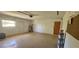 Spacious garage, ideal for storage or workshop, with neutral walls at 17356 Gulfspray Cir, Port Charlotte, FL 33948