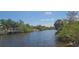 Picturesque water view, perfect for relaxing and enjoying the tranquility of the waterfront at 17356 Gulfspray Cir, Port Charlotte, FL 33948