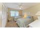 Bedroom with two twin beds, ceiling fan and closet at 175 Kings Hwy # 1114, Punta Gorda, FL 33983