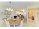 Open concept floorplan featuring the dining area, connecting the living room, kitchen and bathroom at 175 Kings Hwy # 1114, Punta Gorda, FL 33983