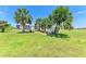 Large green space between residential units at 175 Kings Hwy # 1114, Punta Gorda, FL 33983