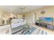 Comfortable living room with tile flooring, ceiling fan, and plush seating at 175 Kings Hwy # 1114, Punta Gorda, FL 33983