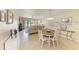 Open-concept living and dining area with comfortable seating and natural light at 175 Kings Hwy # 1114, Punta Gorda, FL 33983