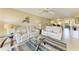 Comfortable living room with tile flooring, ceiling fan, and plush seating at 175 Kings Hwy # 1114, Punta Gorda, FL 33983