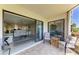 Screened patio with comfortable seating and views of the interior at 175 Kings Hwy # 1114, Punta Gorda, FL 33983