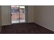 Bedroom with carpet and sliding glass doors to screened balcony at 18001 Richmond Place Dr # 636, Tampa, FL 33647