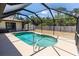 Enclosed inground pool with screened enclosure and an adjacent white tool shed at 21080 Firwood Ter, Port Charlotte, FL 33954