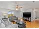 Bright living room offering hardwood floors, comfortable seating, and lots of natural light at 218 Parkview Dr, Venice, FL 34293