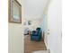 Inviting condo entryway leading to a comfortable living room with stylish decor and ample natural light at 22375 Edgewater Dr # 128, Port Charlotte, FL 33980