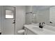 Bright bathroom featuring a modern vanity, stylish fixtures, and tiled floors for a clean aesthetic at 23344 Van Buren Ave, Punta Gorda, FL 33980