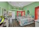 Bright bedroom with vaulted ceilings, hardwood floors, and access to a terrace at 24317 Kintail Ct, Punta Gorda, FL 33980
